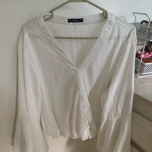 White bell sleeve crop top